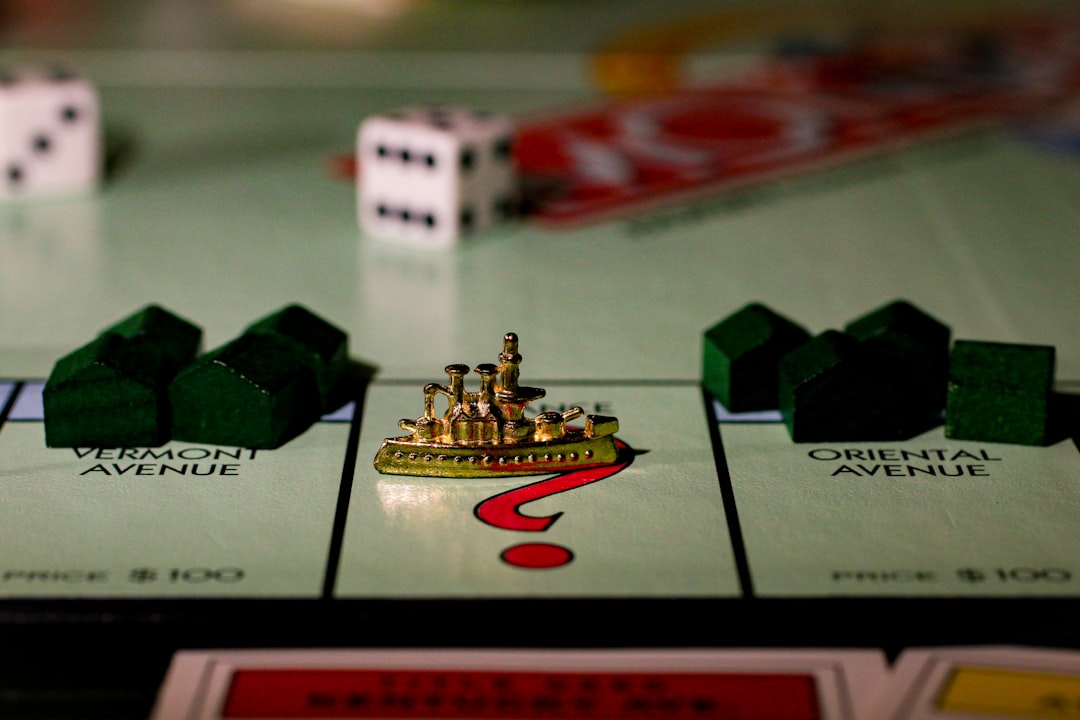 Close up of a Monopoly game battleship token.